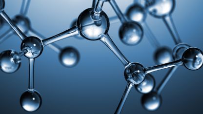 Molecular structure with connected metallic spheres and bonds on a blue background.