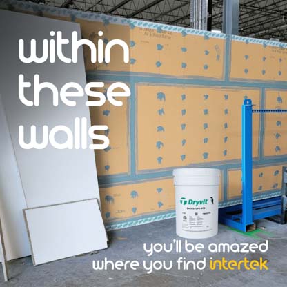 Drywall being installed in a commercial facility
